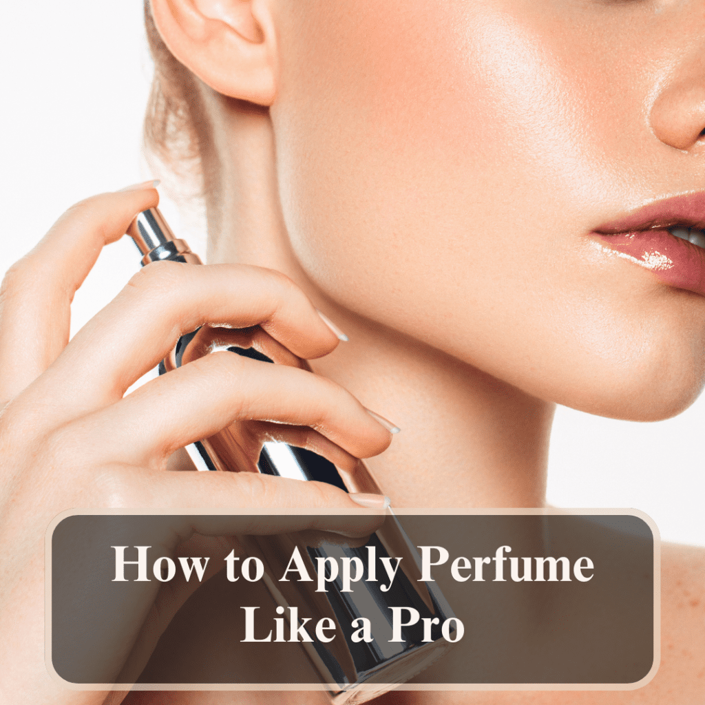 Woman applying perfume to neck